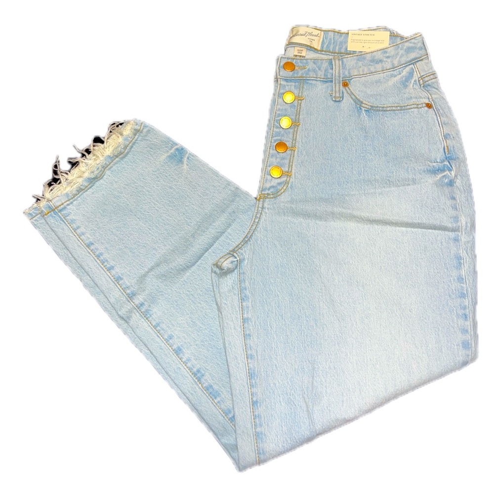 Light wash straight leg with raw hem bottom